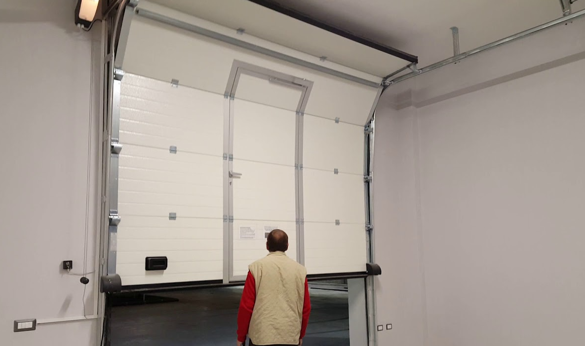 Technicians performing commercial garage door repair at Blue Line Garage Door Repair in Columbus, Ohio